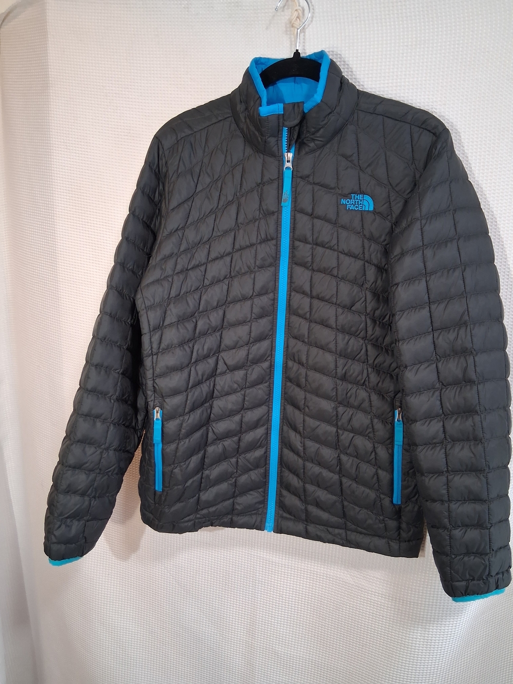 The North Face Kids' Quilted Jacket in Charcoal with Blue Trim